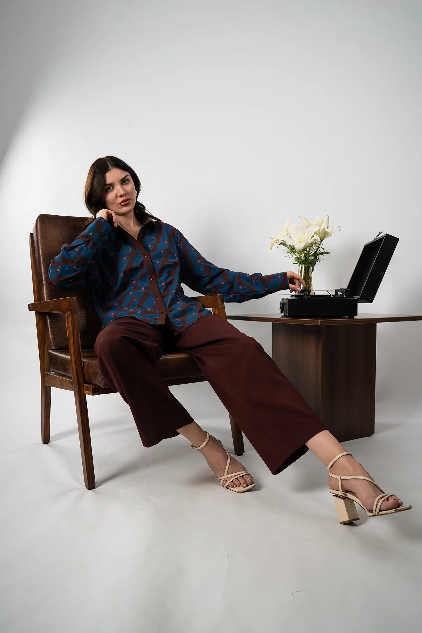 Relaxed pose in digitally printed Chinar shirt – showcasing five-pointed leaf motifs in heritage-inspired styling