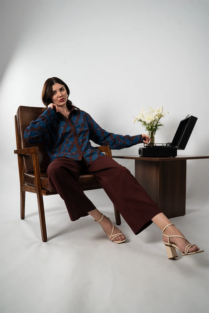 Relaxed pose in digitally printed Chinar shirt – showcasing five-pointed leaf motifs in heritage-inspired styling